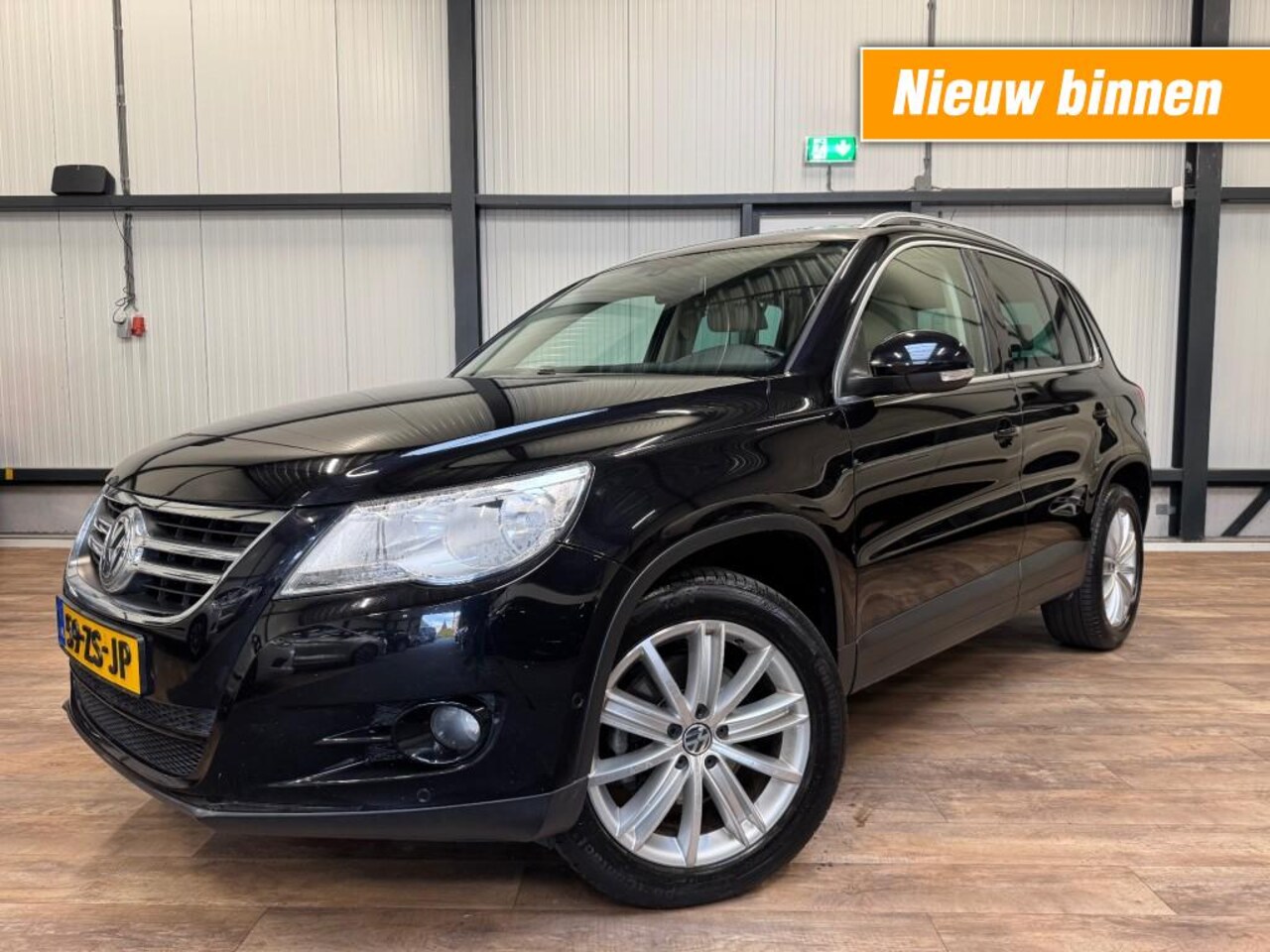 Volkswagen Tiguan - 1.4 TSI SportenStyle 4-Motion / LEDER / CLIMA / NAVI / - AutoWereld.nl