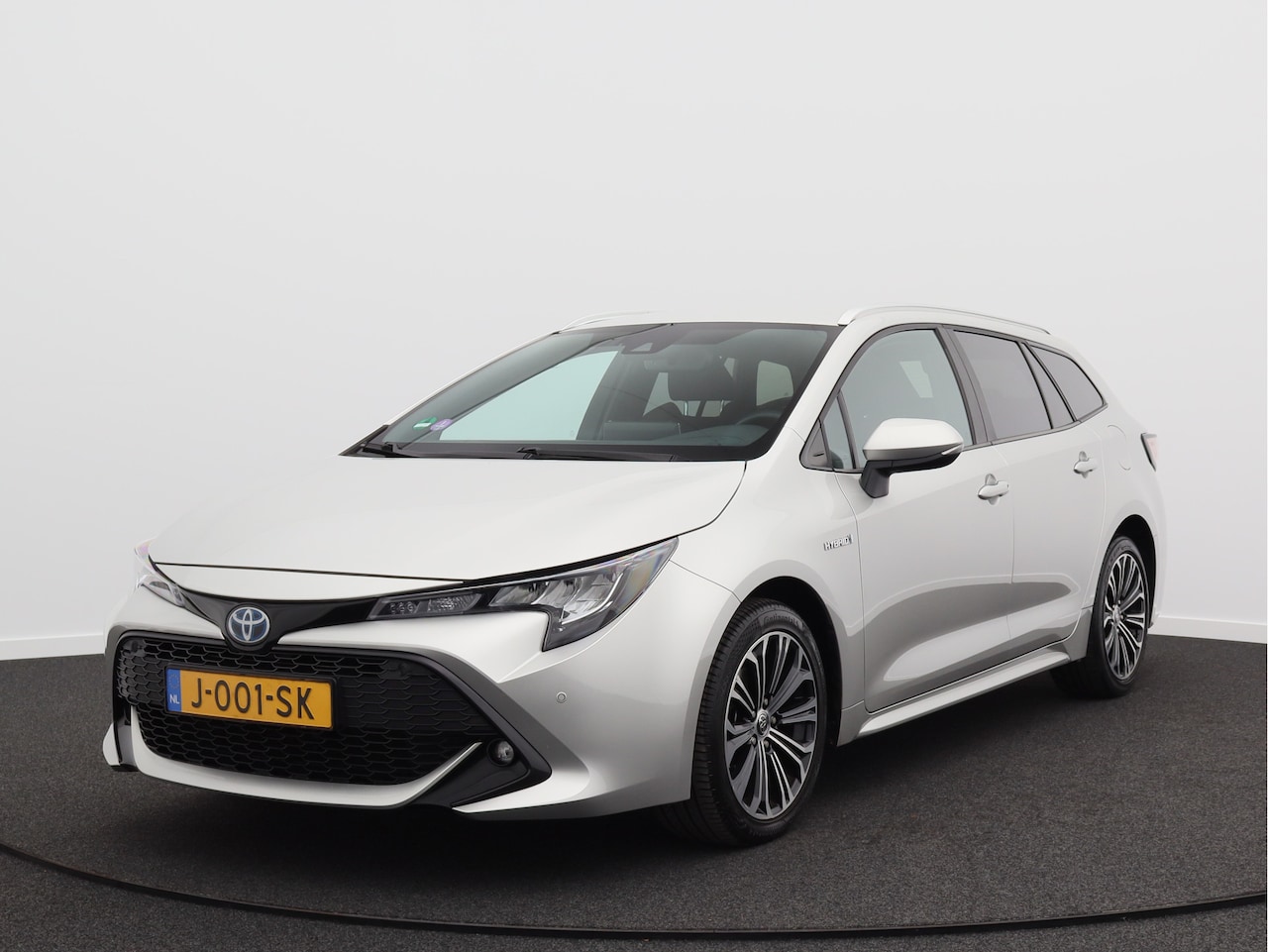 Toyota Corolla Touring Sports - 1.8 Hybrid Dynamic/ lage km/ zeer mooi! - AutoWereld.nl