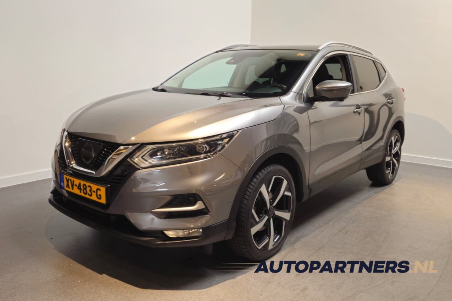 Nissan Qashqai - 1.2 Tekna + -  Stoelverwarming - Panoramadak - Bose Audio - 360 camera - Dodehoek detectie - AutoWereld.nl