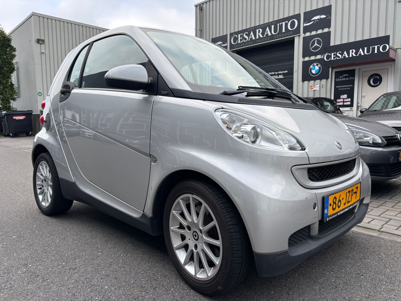 Smart Fortwo coupé - 1.0 mhd Passion / 94 DKM / LEER - AutoWereld.nl