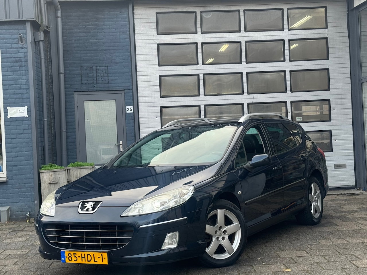 Peugeot 407 SW - 2.0 ST Pack Business Intro | Clima | Camera | Pano - AutoWereld.nl