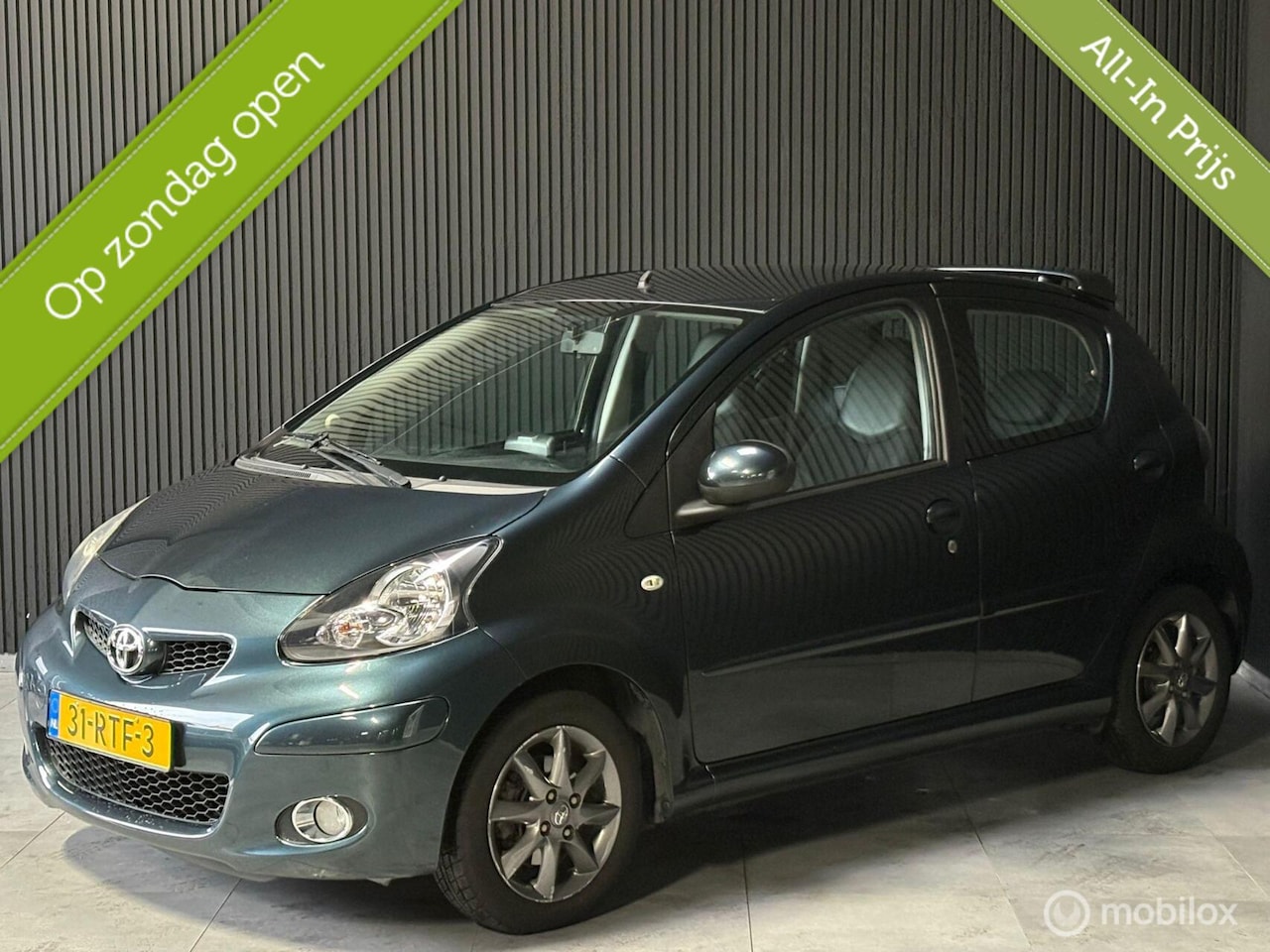 Toyota Aygo - 1.0-12V Aspiration Green - Navi - Airco - Leder - - AutoWereld.nl