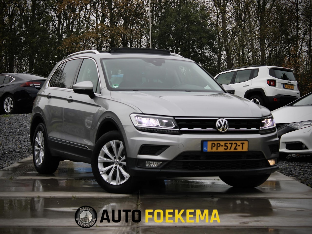 Volkswagen Tiguan - 2.0 TDI Comfortline Business Lane assist LED Pano - AutoWereld.nl
