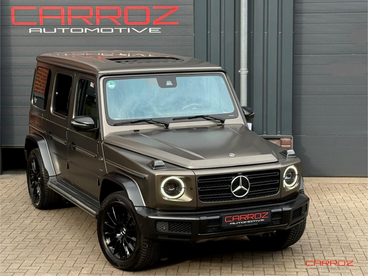Mercedes-Benz G-klasse - 400 D AMG Pano ACC 360 CarPlay Navi Burmester Ambiance Trekhaak - AutoWereld.nl