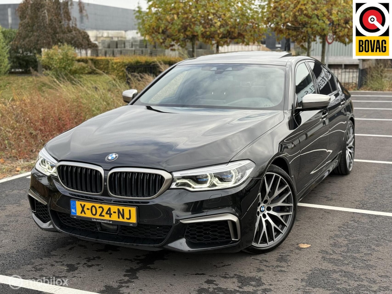 BMW 5-serie - M550i xDrive High Executive PANO|360|LEDER|H&K|HUD - AutoWereld.nl