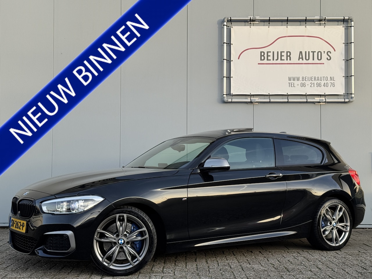 BMW 1-serie - M140i High Executive Automaat Schuifdak/18 inch. - AutoWereld.nl