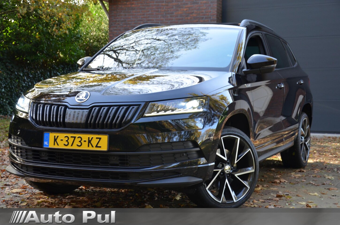 Skoda Karoq - 1.5 TSI ACT Sportline Business Automaat/Navi/Audio installatie premium/Led/Pdc/Ecc/Stoelve - AutoWereld.nl