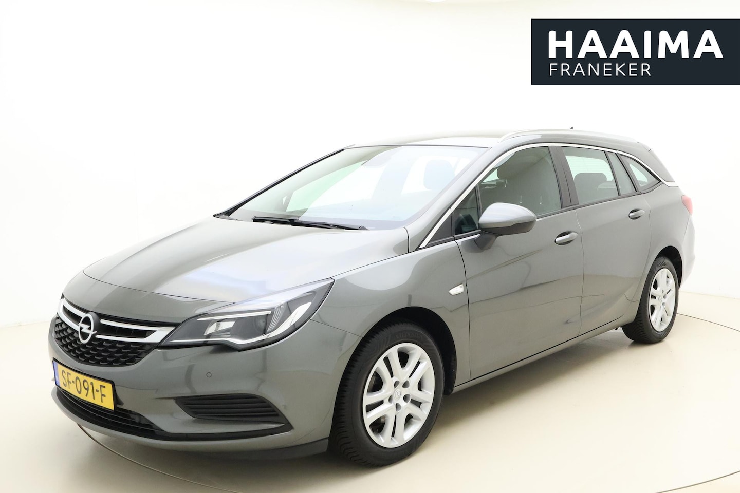 Opel Astra Sports Tourer - 1.0 Business+ 105pk | Navigatie | Climate Control | Stoel-Stuurverwarming | Trekhaak | Par - AutoWereld.nl