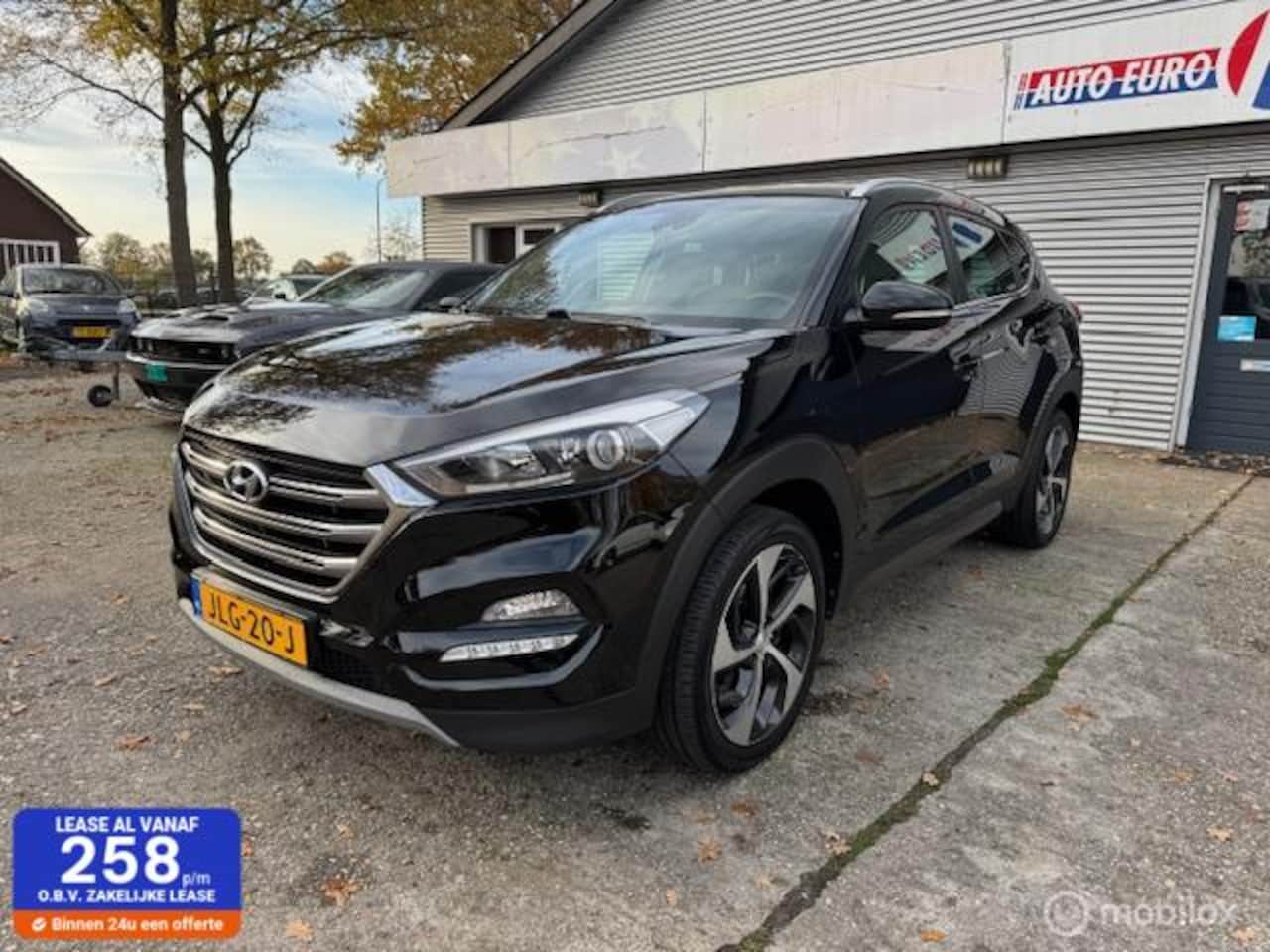Hyundai Tucson - 1.6 GDi Premium Leder+Navi+Camera! - AutoWereld.nl