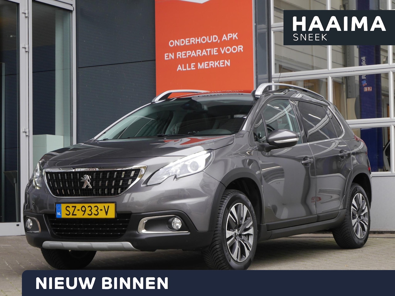 Peugeot 2008 - 1.2 PureTech Blue Lease Executive | Trekhaak | Cruise control | Climate control | Navigati - AutoWereld.nl