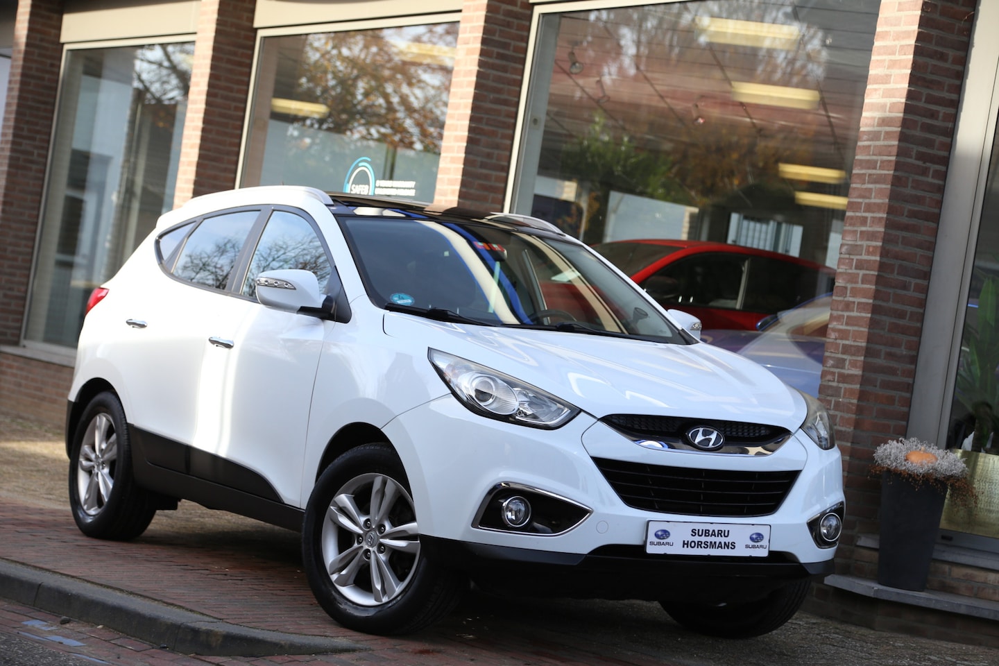 Hyundai ix35 - 2.0i Style Schuifdak Leer - AutoWereld.nl