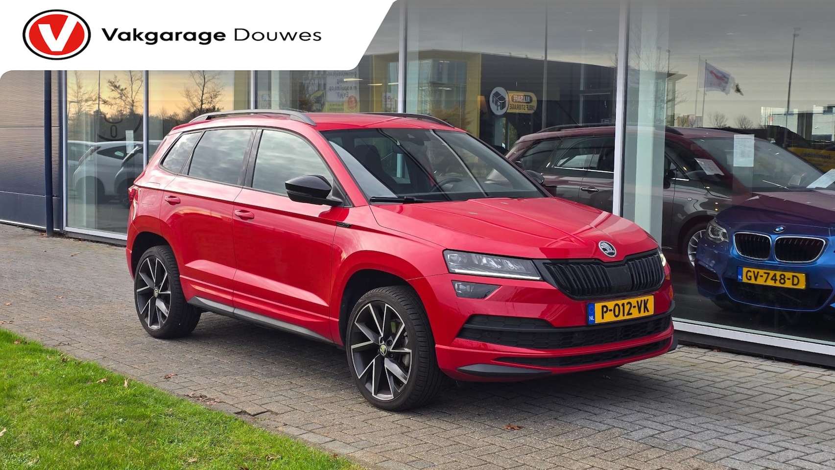 Skoda Karoq - 1.5 TSI ACT Style Sportline | Automaat | ACC | Stoel- & Stuurverwarming | Canton Audio | K - AutoWereld.nl