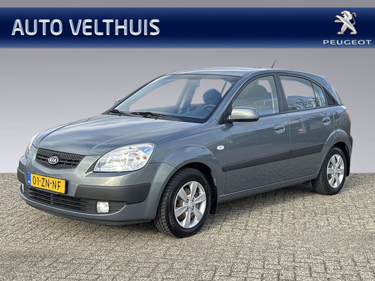 Kia Rio - 1.4 97pk HB X 5-drs *airco, radio/cd, trekhaak* - AutoWereld.nl