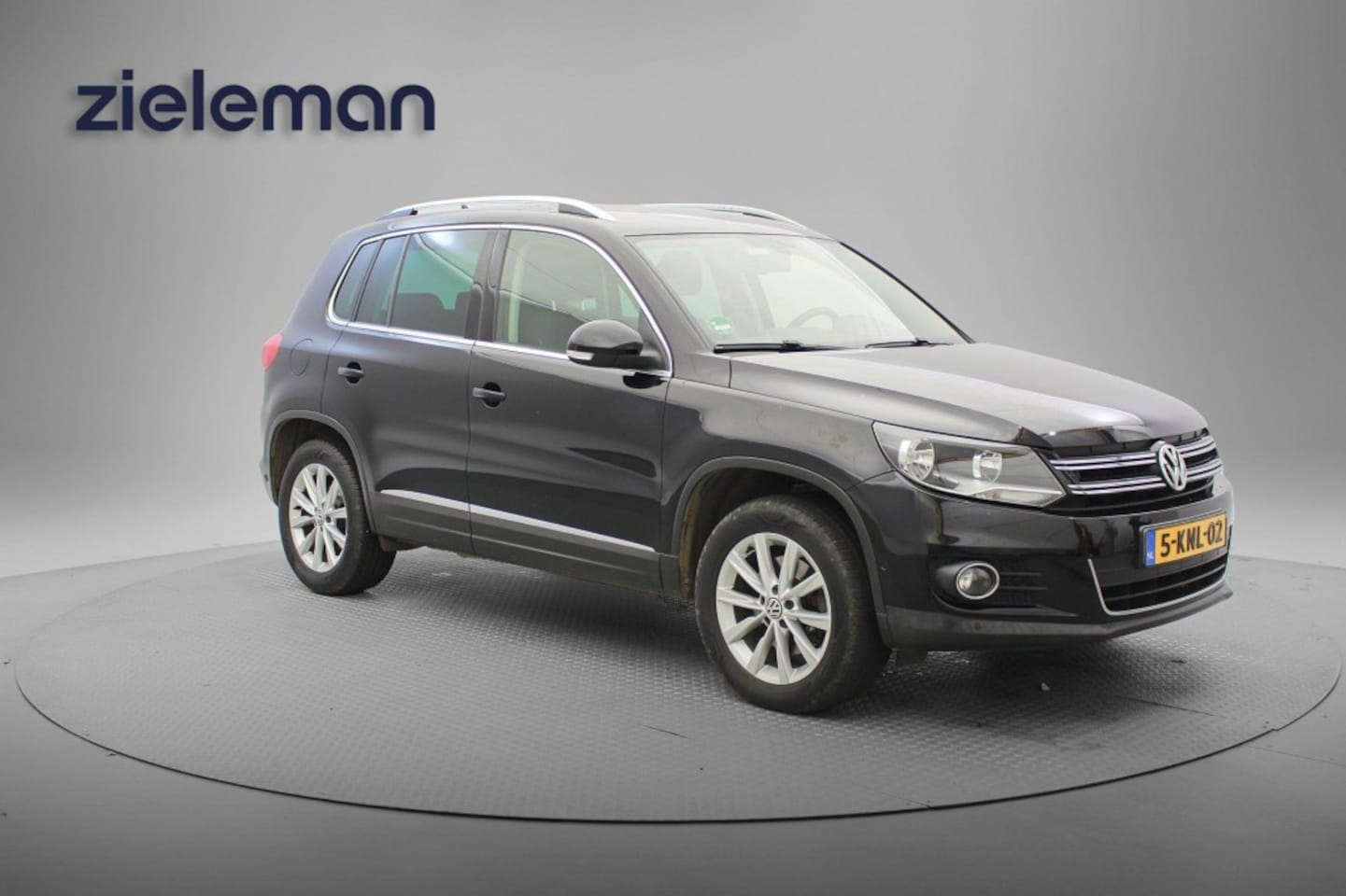 Volkswagen Tiguan - 2.0 TDI 4Motion Sport en Style Automaat - Navi, Cruise, Clima, Stoelverw. - AutoWereld.nl