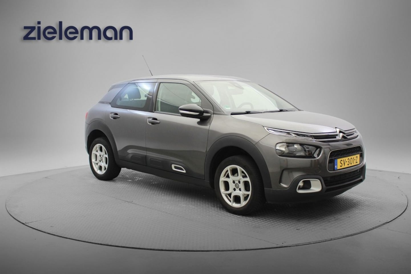 Citroën C4 Cactus - 1.2 PureTech Business - Carplay, Navi, Cruise, Clima, Trekhaak - AutoWereld.nl