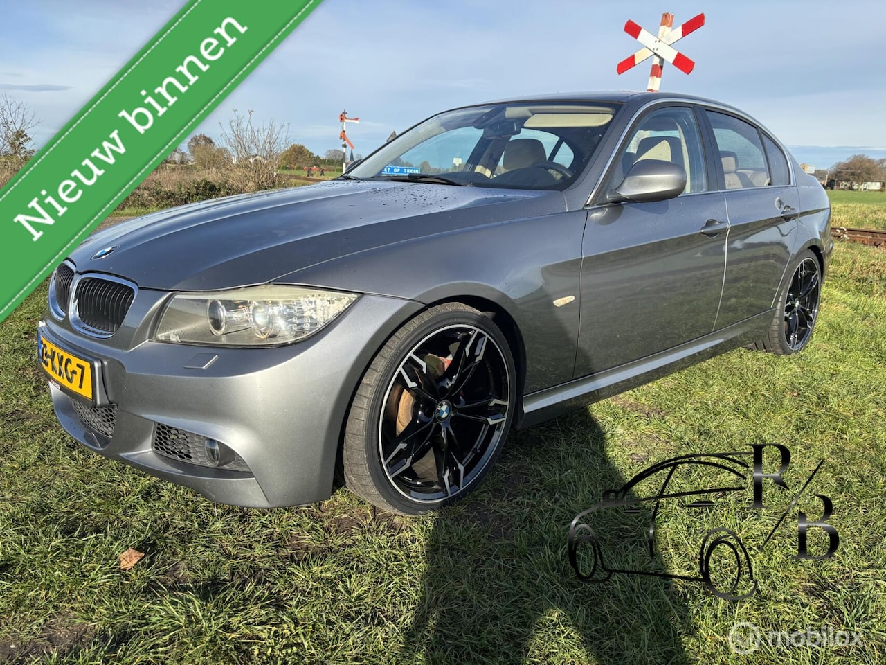 BMW 3-serie - 318i Business Line AUTOMAAT AIRCO NAVI CRUISE - AutoWereld.nl