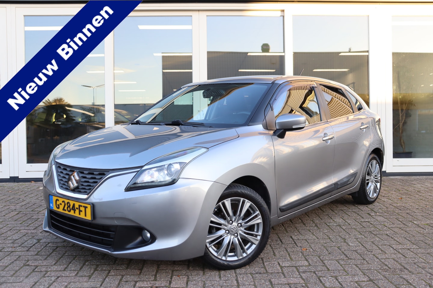Suzuki Baleno - 1.0 Boosterjet High Executive 1.0 Boosterjet High Executive, Cruise Control, Camera, Airco, Navigatie, Stoelverwarming, - AutoWereld.nl