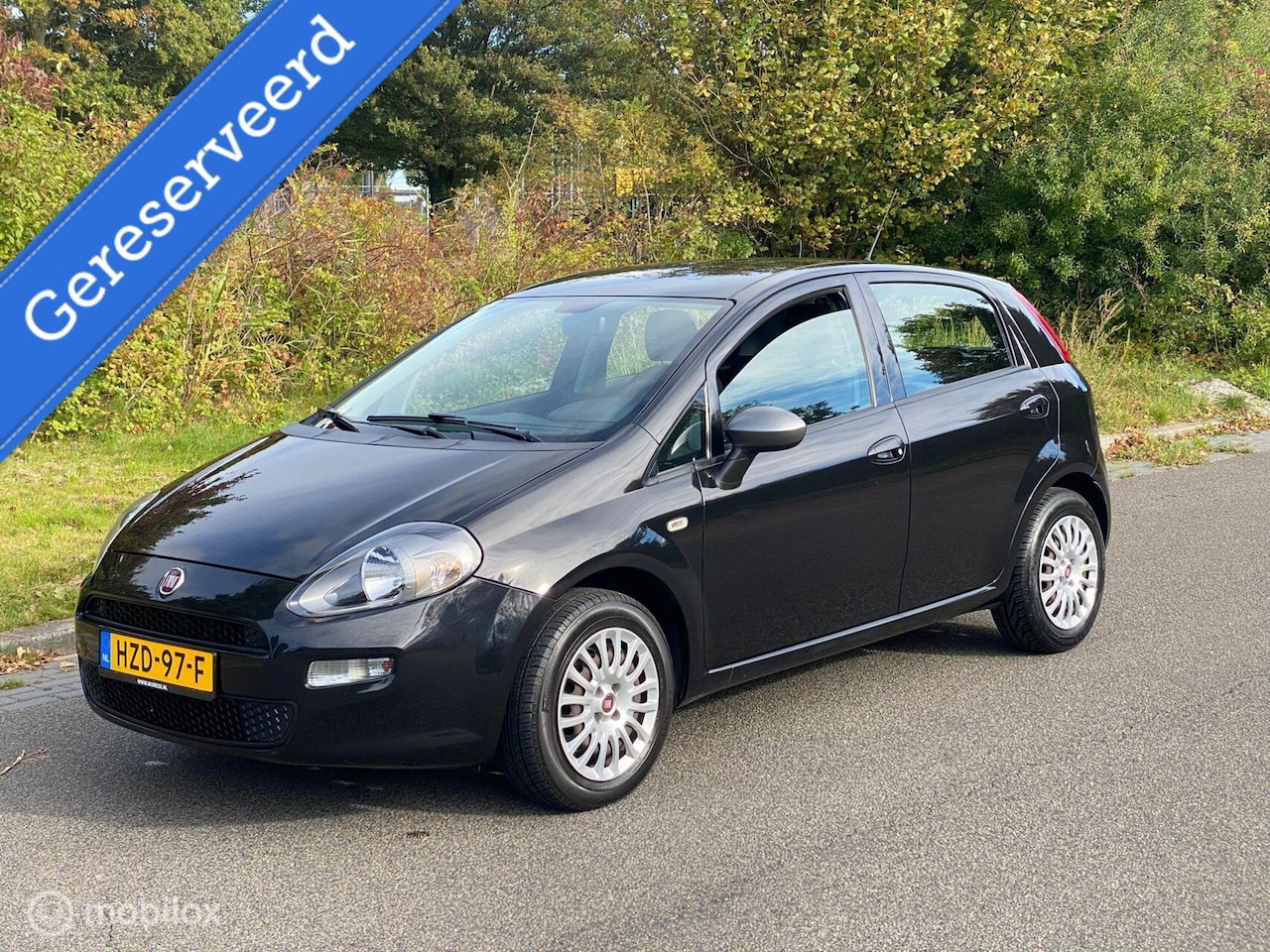 Fiat Punto - Lounge 1.2 Street Navi Airco 1 eig !! - AutoWereld.nl