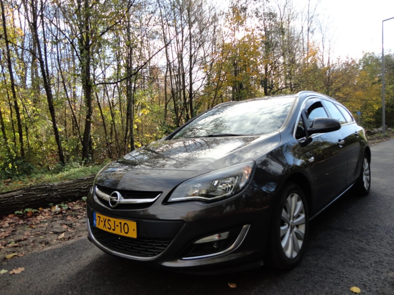 Opel Astra Sports Tourer - 1.4 Turbo Business + Bomvol - AutoWereld.nl