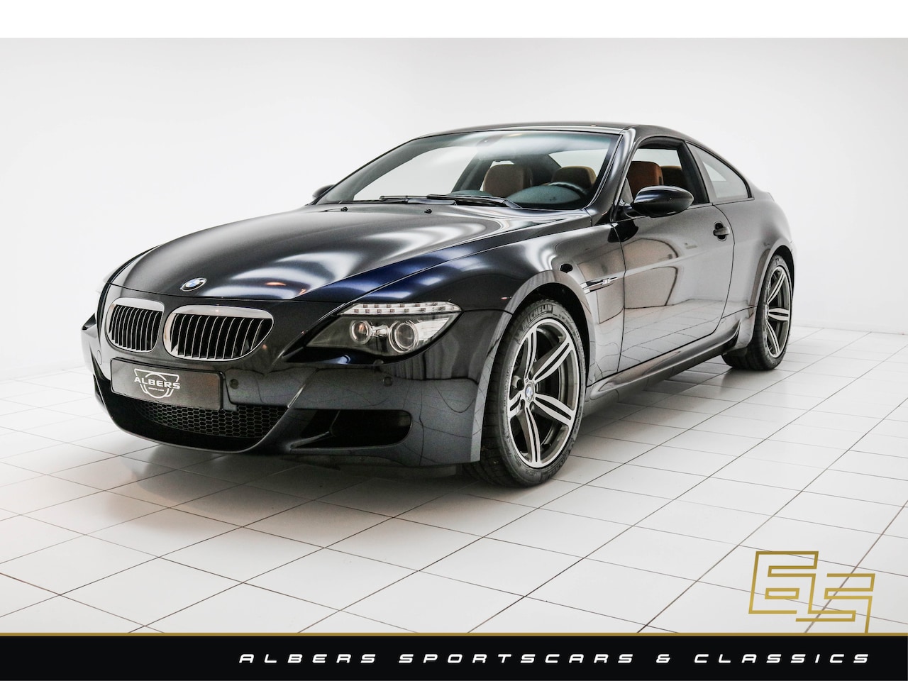 BMW M6 - E63 V10 Coupé 14.000 km - Full history - Full options - Individual - AutoWereld.nl