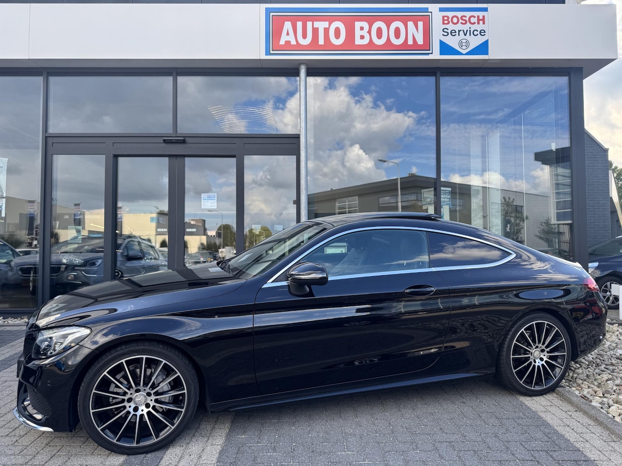 Mercedes-Benz C-klasse Coupé - 180 AMG PANO/P-CAM/19INCH.AMG/NAVI/CLIMA/ LED/S&S- 2e EIG. - KM=NAP - - AutoWereld.nl