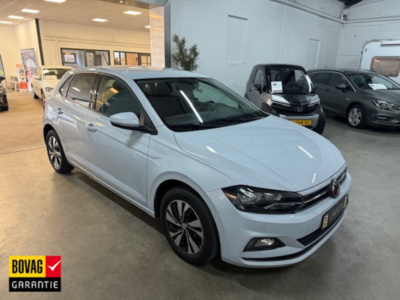 Volkswagen Polo - 1.0 TSI Comfortline / AIRCO / NAVI / LMV / APPLE CARPLAY - AutoWereld.nl