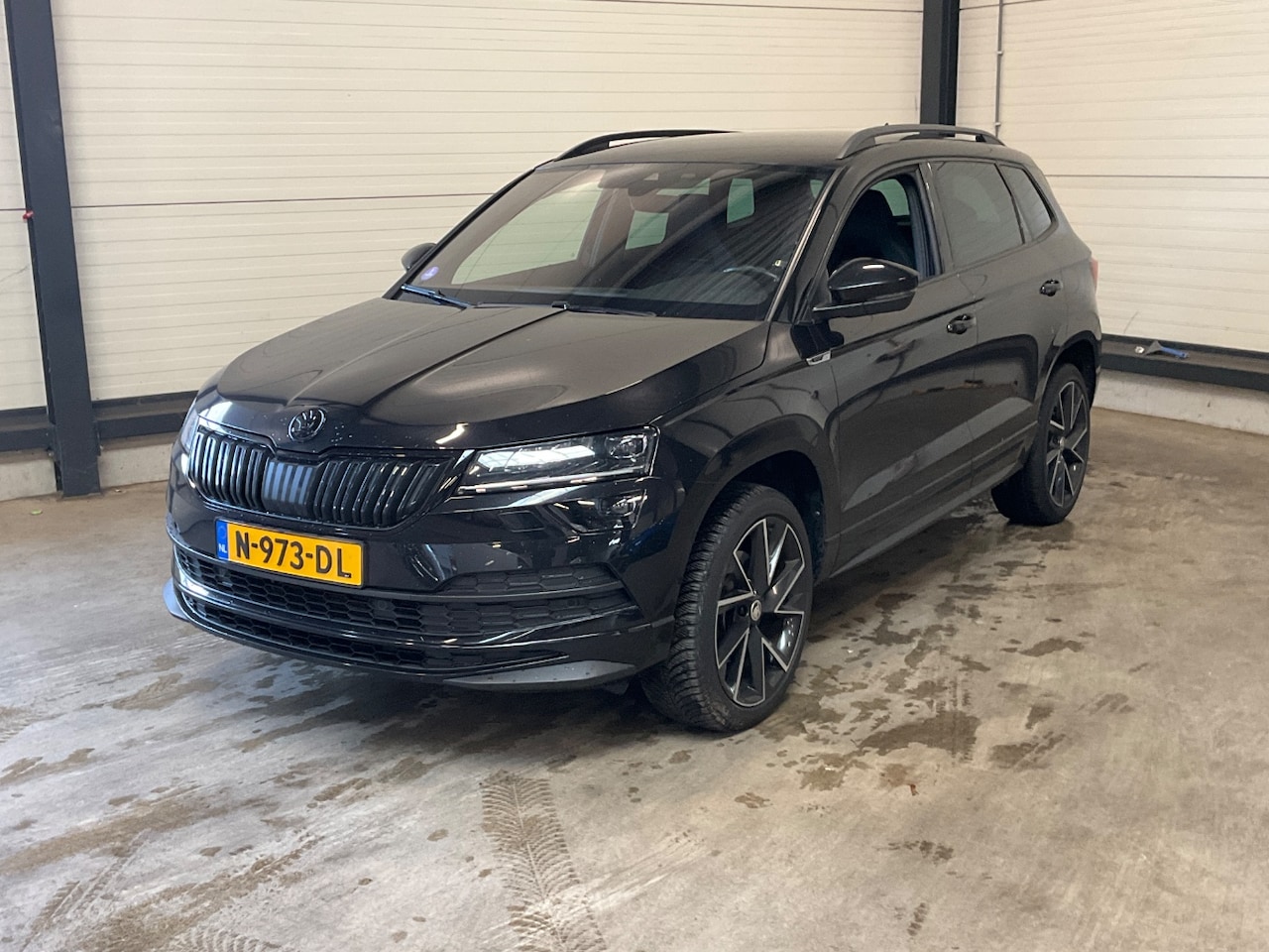 Skoda Karoq - 1.5 TSI 150 pk ACT Sportline Business 7-DSG | Achteruitrijcamera | Cruise control | Stoelv - AutoWereld.nl