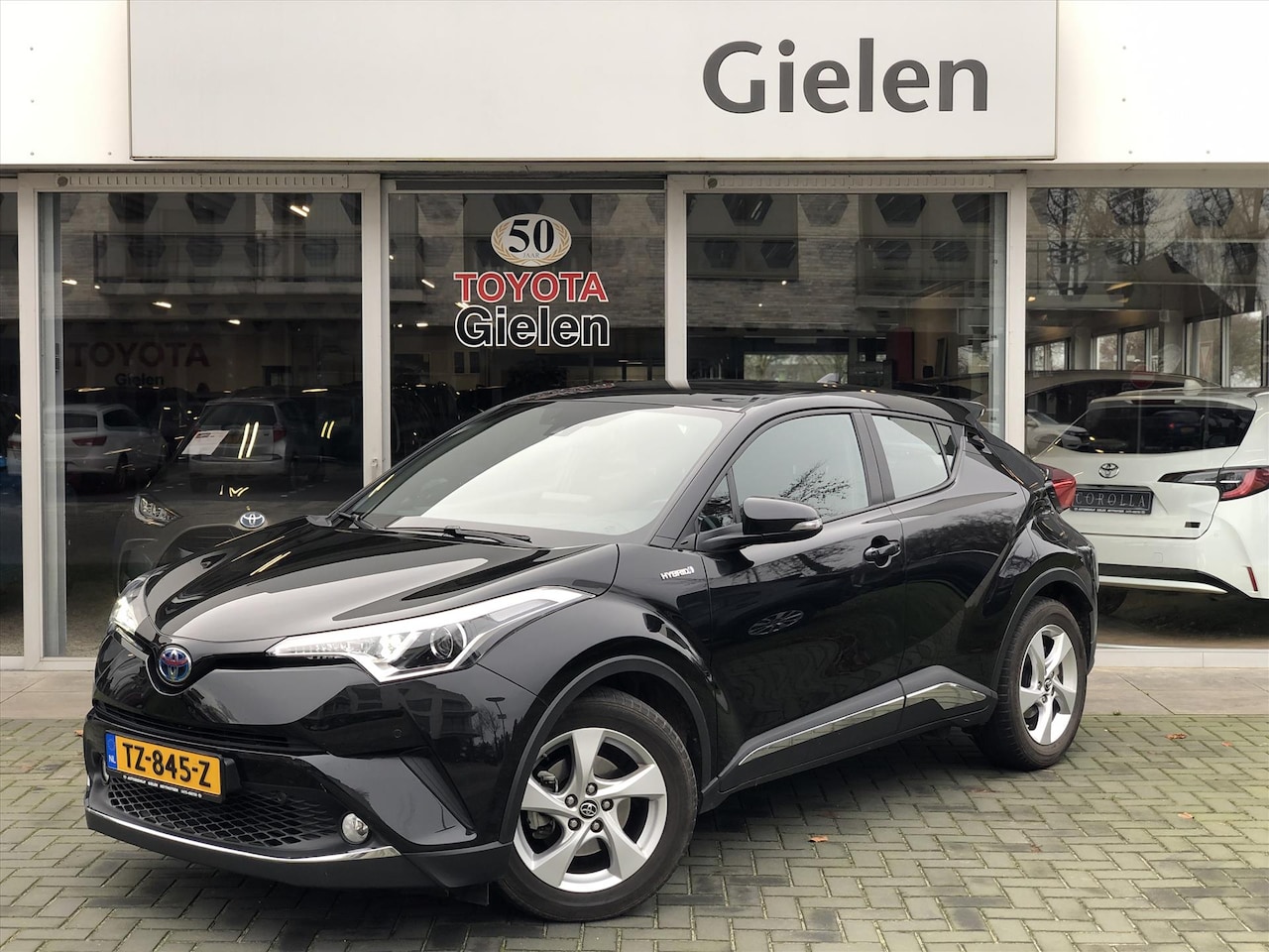 Toyota C-HR - 1.8 Hybrid Dynamic | Navigatie, Dodehoekherkenning, Parkeersensoren, Stoelverwarming, Chro - AutoWereld.nl