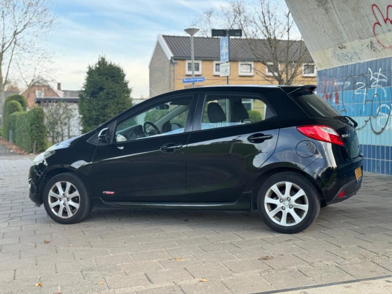 Mazda 2 - 1.3 BIFUEL GT-M Line G3 Mooie Auto Voor Een Mooie Prijs € 4.999,- - AutoWereld.nl