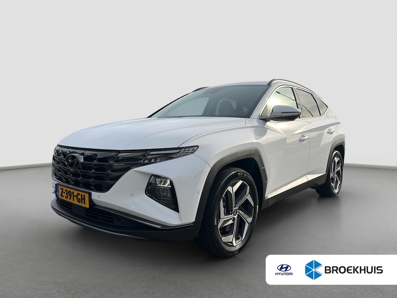 Hyundai Tucson - 1.6 T-GDI 265pk PHEV Premium 4WD | Leder | Carplay | Climate | Trekhaak | Navigatie | Elek - AutoWereld.nl