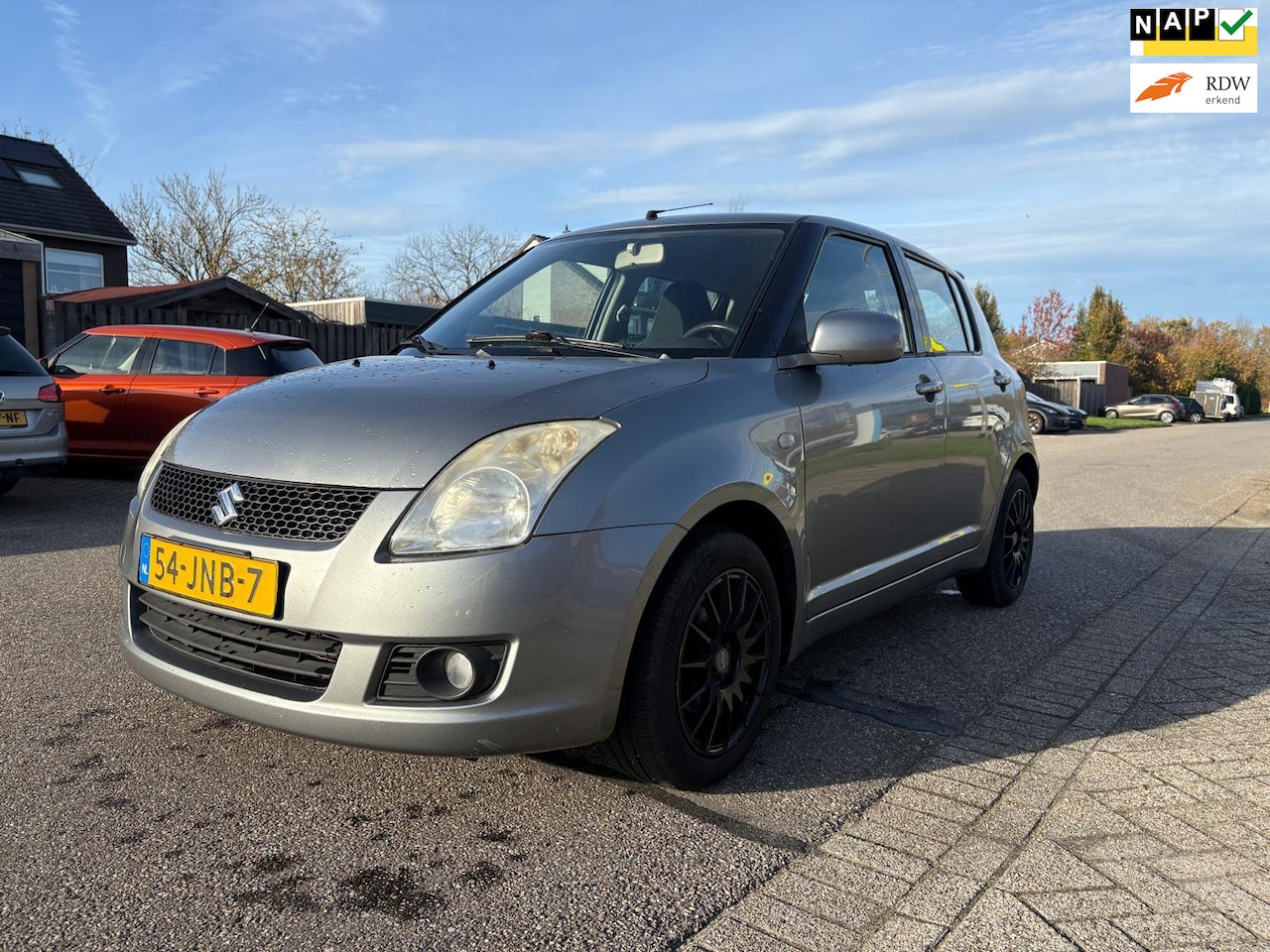 Suzuki Swift - 1.3 Bandit 5DR*Navigatie*Clima*NAP*LM velgen*19-07-2026 APK*2e eigenaar* - AutoWereld.nl