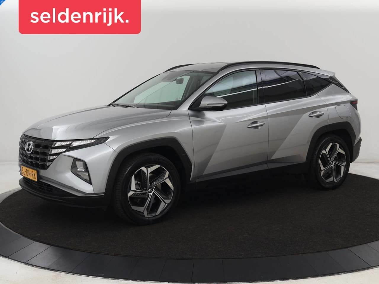Hyundai Tucson - 1.6 T-GDI PHEV Comfort 4WD | Trekhaak | Carplay | Adaptive cruise | Camera | Climate contr - AutoWereld.nl