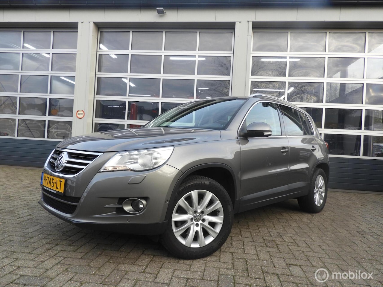 Volkswagen Tiguan - 1.4 TSI Sport&Style - AutoWereld.nl