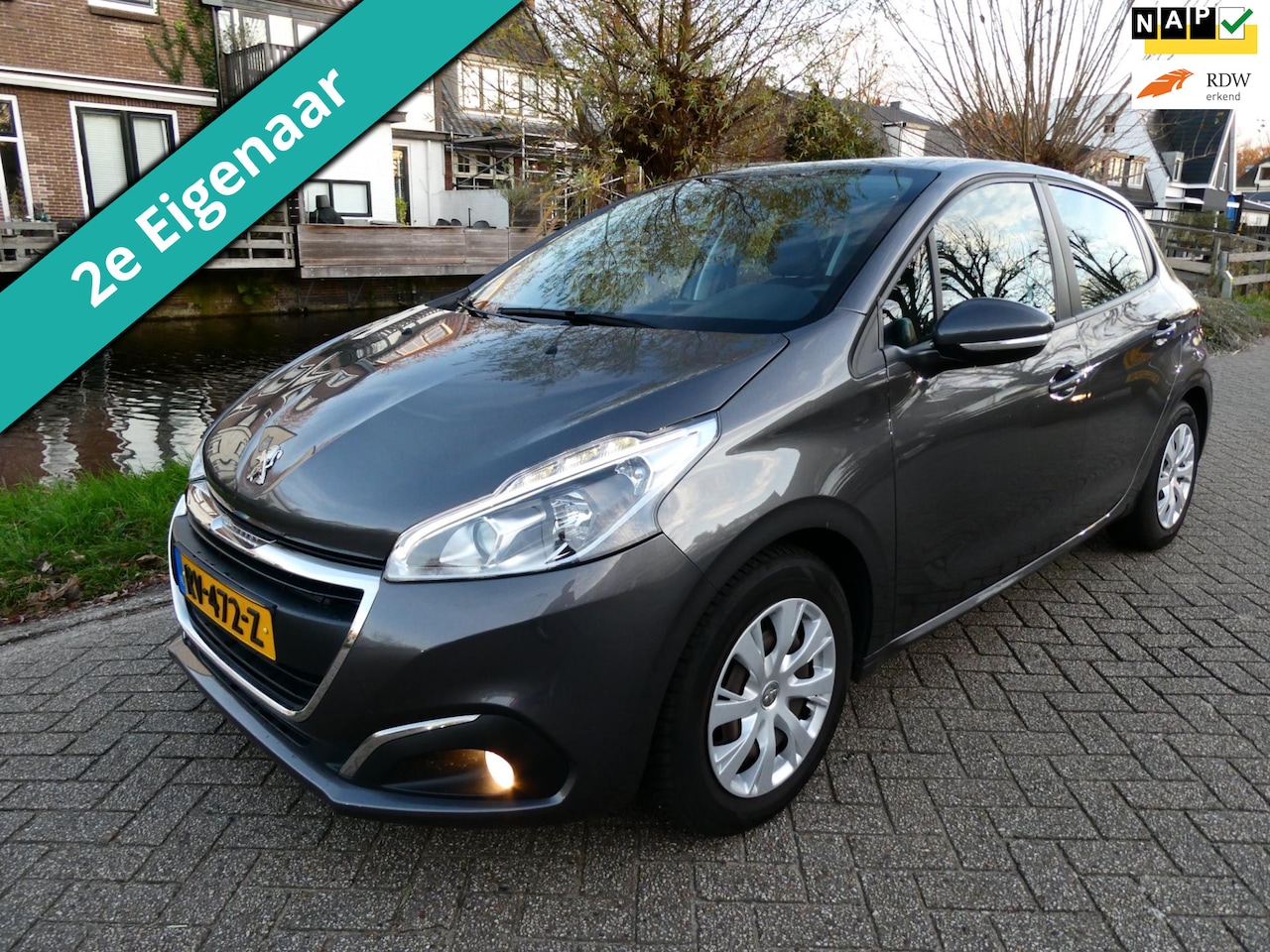 Peugeot 208 - 1.2i 5-deurs 2e eig. Historie Airco Cruise Navi Carplay PDC - AutoWereld.nl