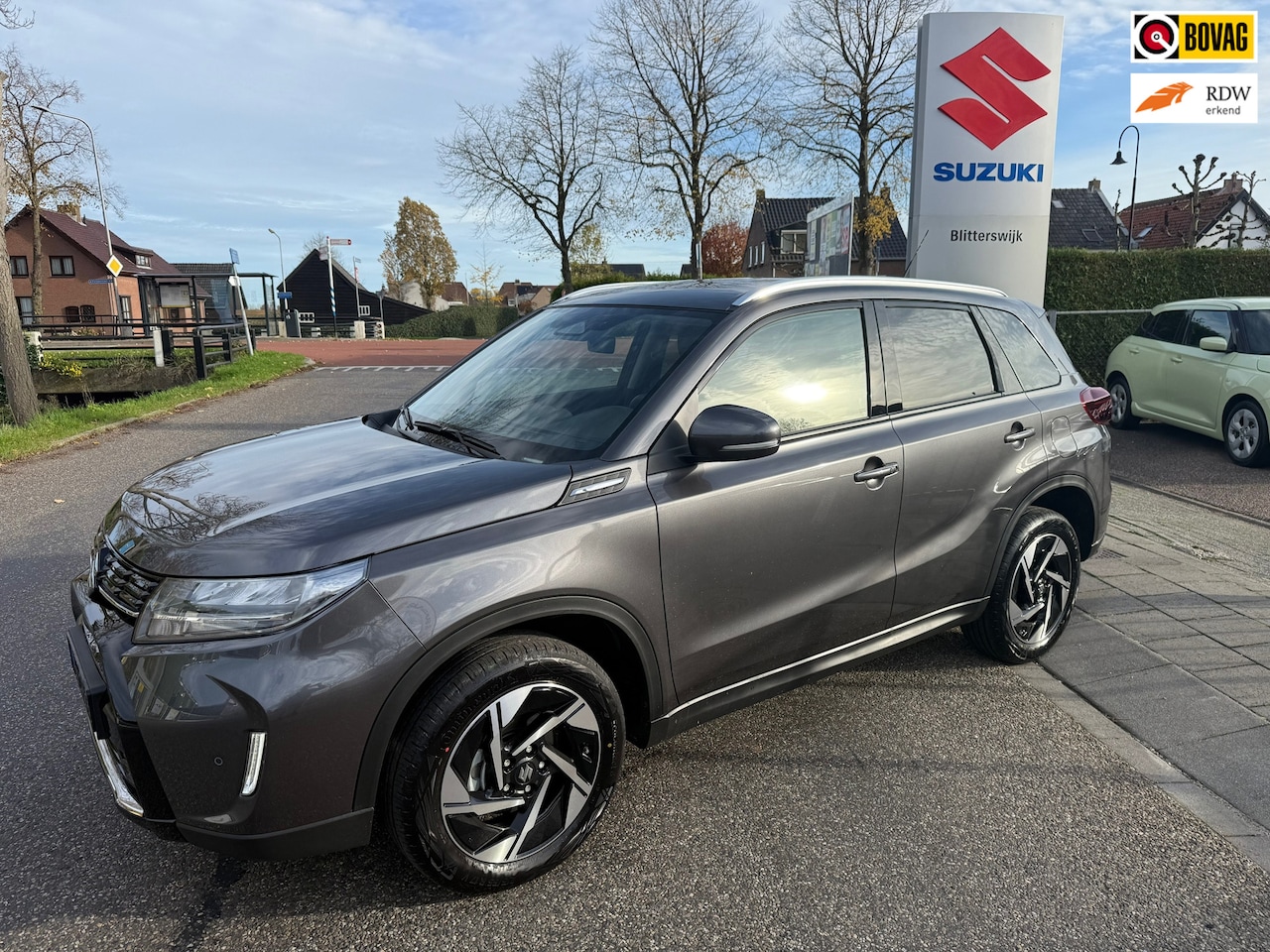 Suzuki Vitara - 1.4 Boosterjet Smart Hybrid Style AUTOMAAT // Lederen bekleding // Snel te rijden // Rijkl - AutoWereld.nl