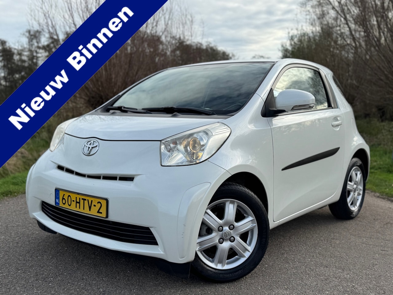 Toyota iQ - 1.0 VVTi Comfort / Radio-CD Speler / LM velgen / Cruise Control / Airco / NAP - AutoWereld.nl