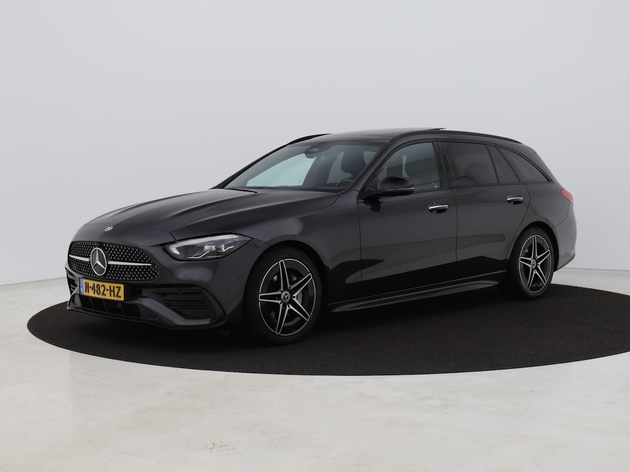Mercedes-Benz C-klasse Estate - 200 Launch Edition AMG Line | PANO | CAMERA | KEYLESS | SFEERVERLICHTING | STOELVERW. - AutoWereld.nl