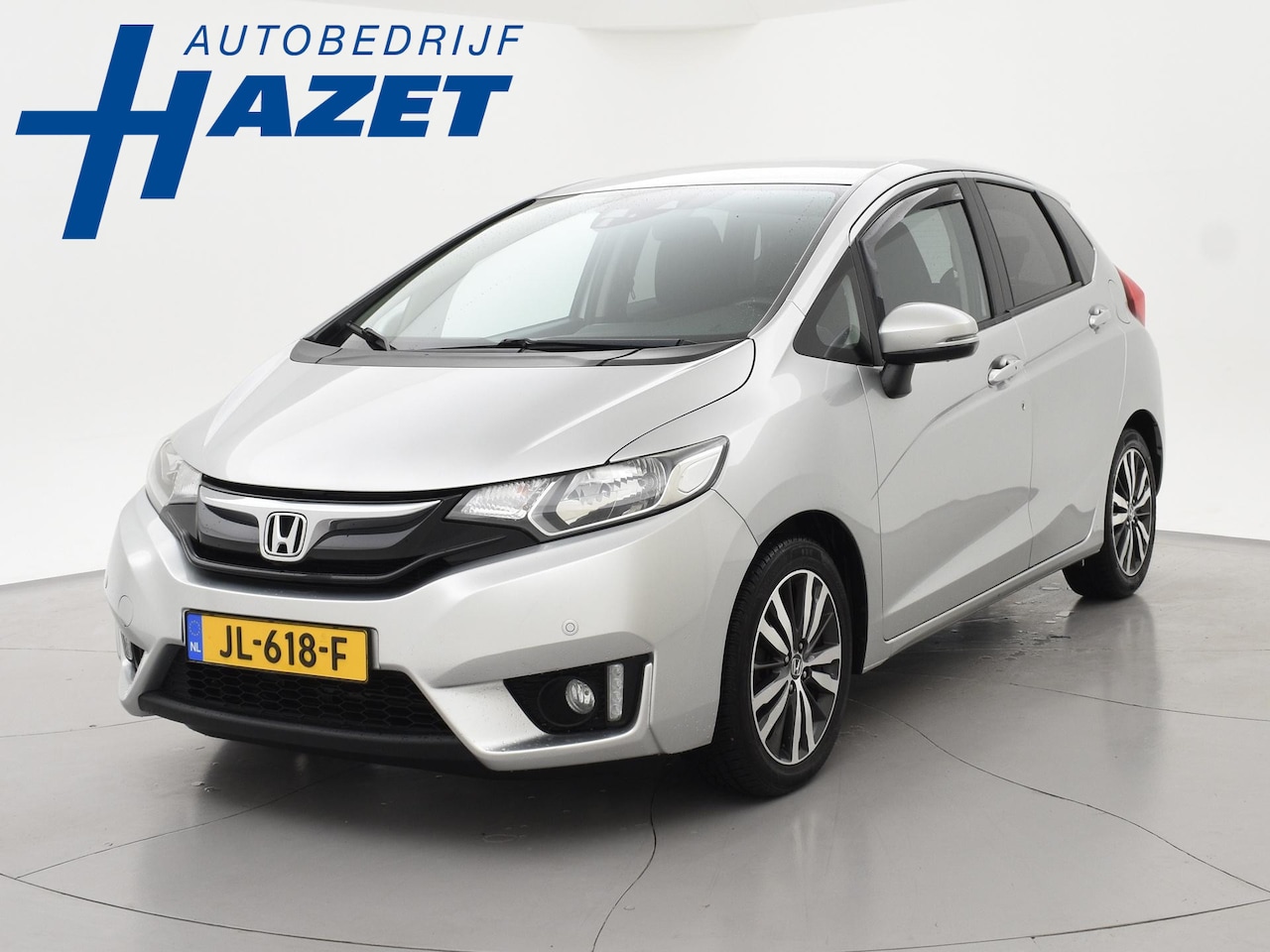 Honda Jazz - 1.3 i-VTEC AUT. ELEGANCE + AFN. TREKHAAK | CAMERA | NAVIGATIE | PARKEERSENSOREN | CLIMATE - AutoWereld.nl
