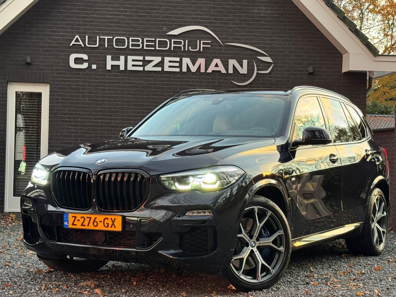 BMW X5 - XDrive45e 2021 Carplay M-pakket 360 Adaptive Cruise Ambient Carbonschwarz - AutoWereld.nl