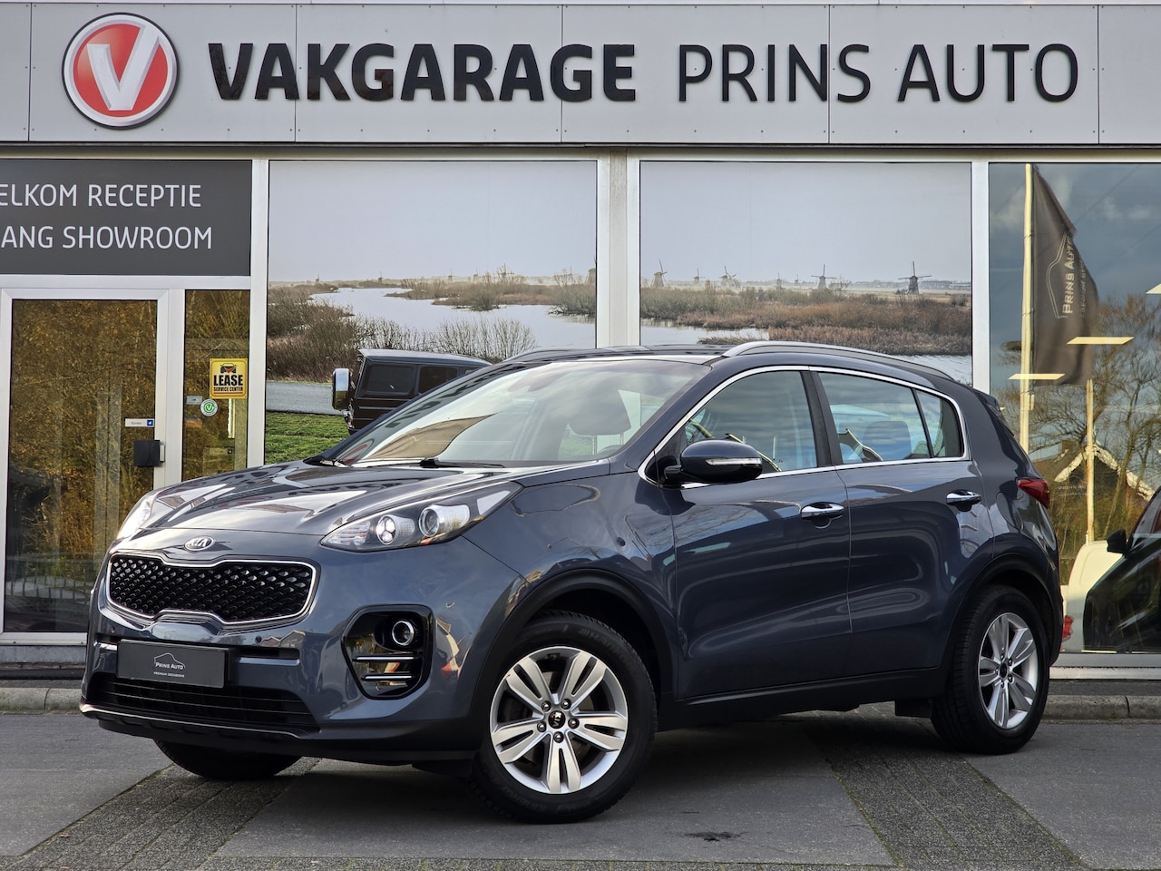 Kia Sportage - 1.6 GDI ComfortLine Navigator |TREKHAAK|STUUR+STOELVERW. V+A|NAVI|VOLL. ONDERH| 4031 - AutoWereld.nl