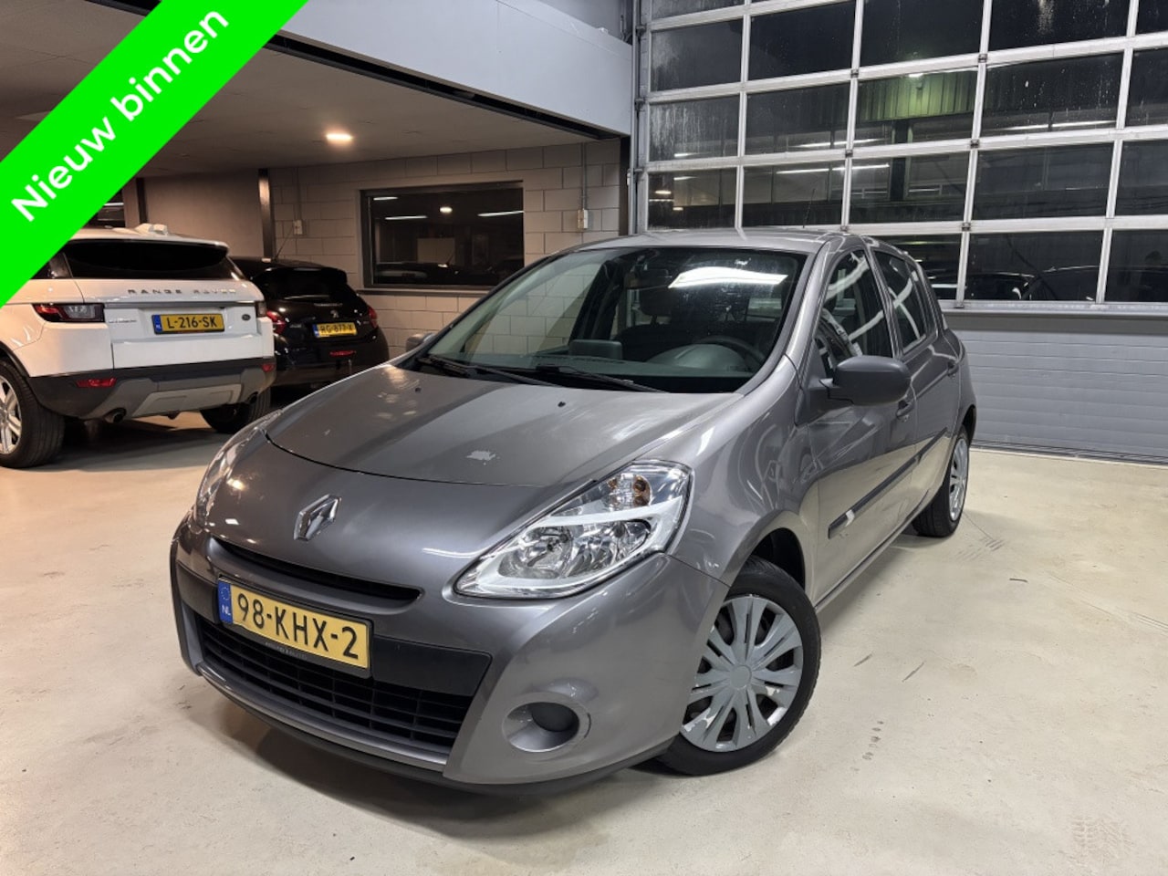 Renault Clio - 1.2 Special Line navigatie/clima nap - AutoWereld.nl