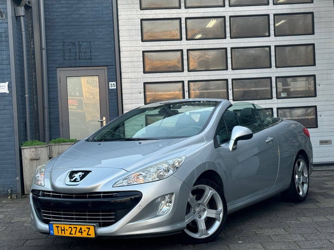 Peugeot 308 CC - 1.6 THP Sport Pack | Navi | Clima | Leer - AutoWereld.nl