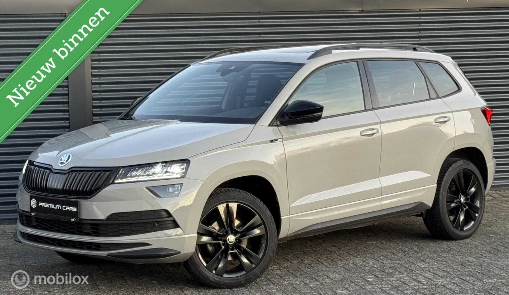 Skoda Karoq - 1.5 TSI Pano Keyless Trekhaak Camera Canton - AutoWereld.nl