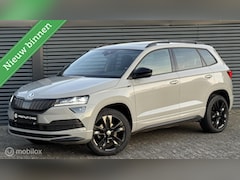 Skoda Karoq - 1.5 TSI Pano Keyless Trekhaak Camera Canton