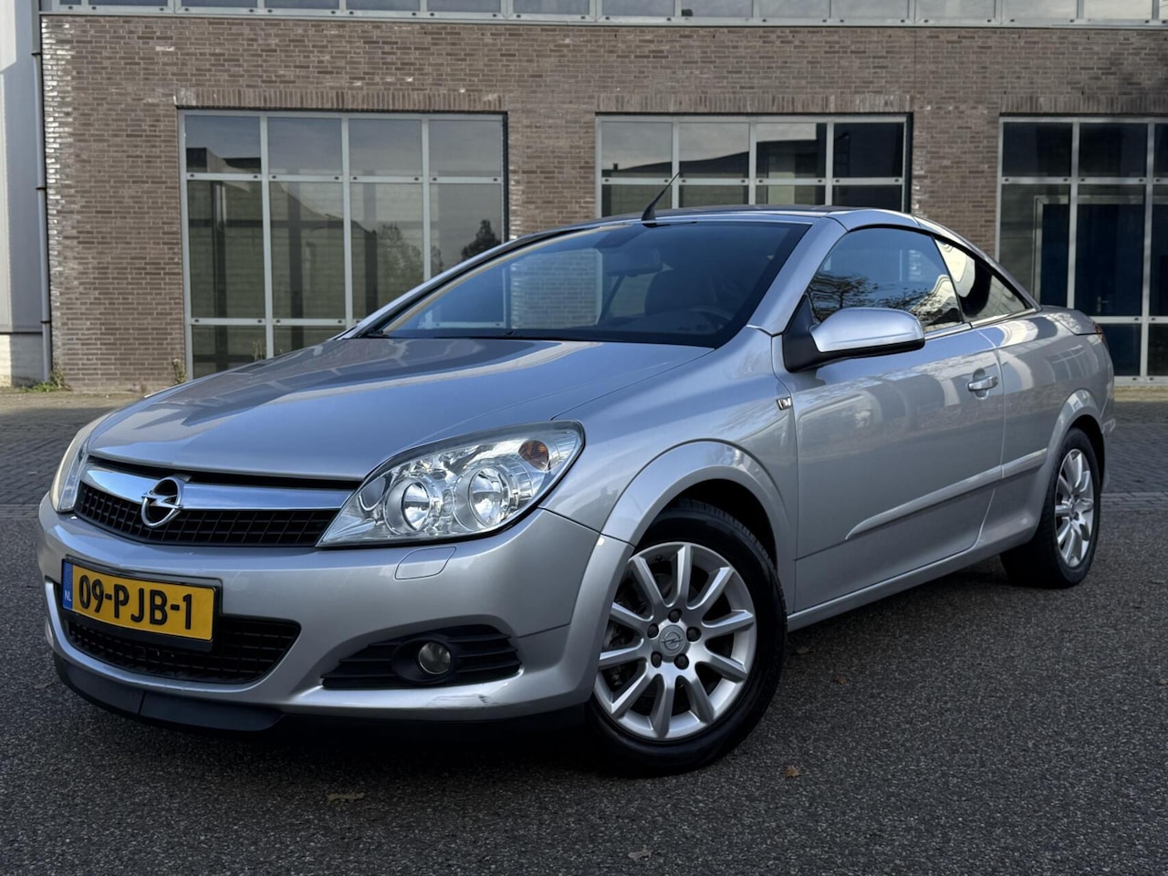 Opel Astra TwinTop - 1.8 Sport / KEYLESS / PDC / NAVI - AutoWereld.nl