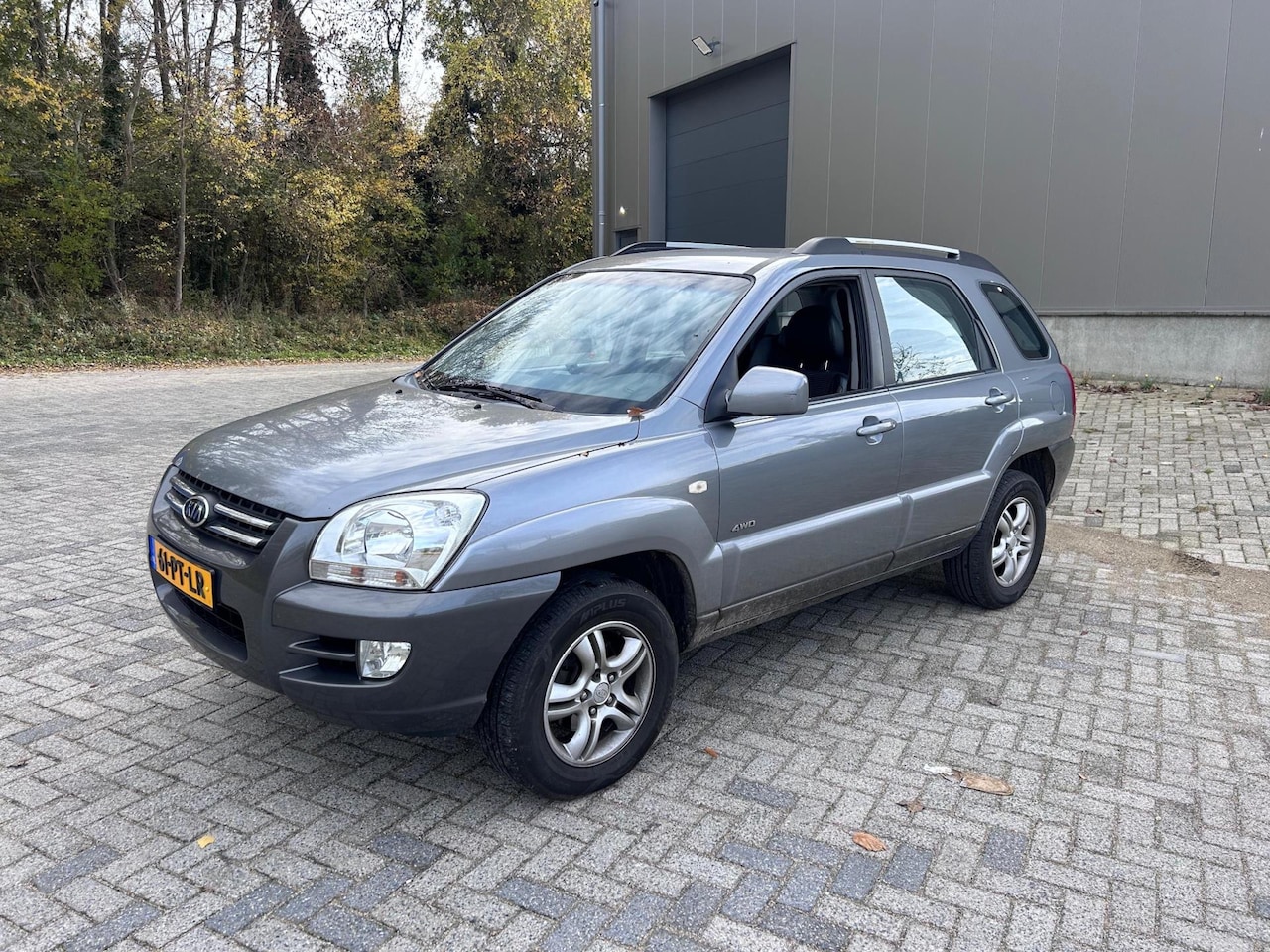 Kia Sportage - 2.0 CVVT Adventure 4WD Clima Trekhaak - AutoWereld.nl
