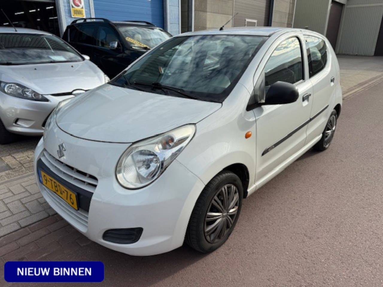 Suzuki Alto - 1.0 Comfort EASSS 2014 Airco 87.274km NAP Leuk auto van de 2e eigenaar. Boekjes zijn aanwe - AutoWereld.nl
