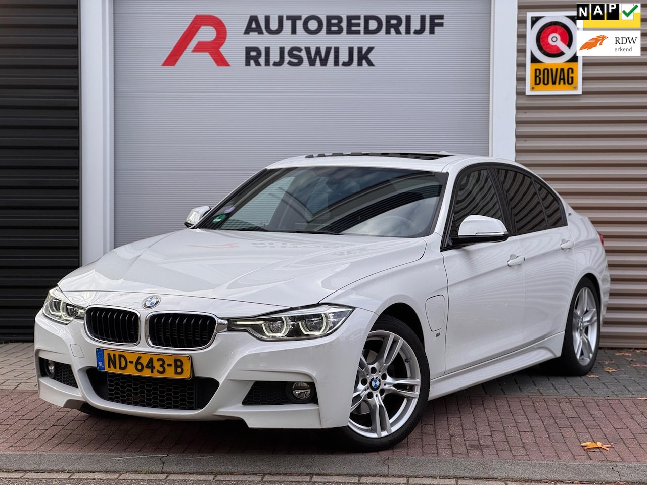 BMW 3-serie - 330e Centennial High Executive Dak/Navi/Led - AutoWereld.nl