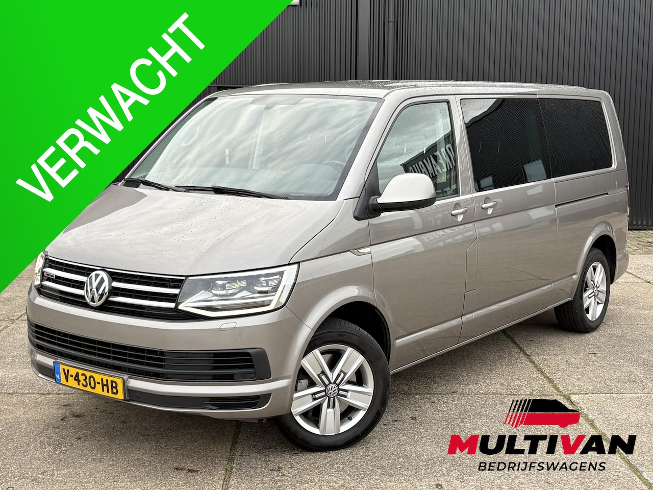 Volkswagen Transporter Multivan - 2.0 TDI L2H1 DC 4Motion Multivan ** NET BINNEN ** STANDKACHEL | 2x SCHUIFD | STOELVERWARMI - AutoWereld.nl