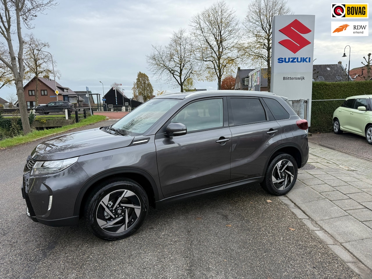 Suzuki Vitara - 1.4 Boosterjet Smart Hybrid Style AUTOMAAT // Panorama dak // Lederen bekleding // Snel te - AutoWereld.nl